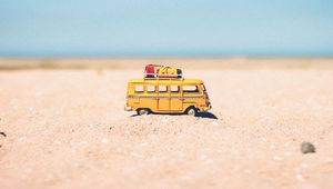 Preview wallpaper bus, toy, sand, beach, yellow