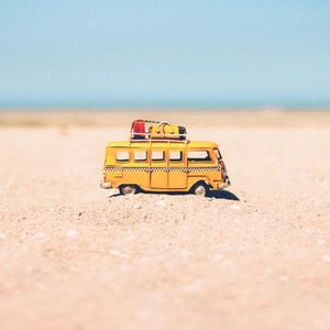 Preview wallpaper bus, toy, sand, beach, yellow