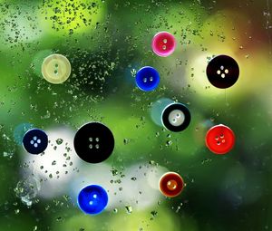 Preview wallpaper buttons, colorful, wet, surface