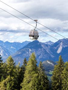 Preview wallpaper cabin, cable car, spruce, mountains, sky