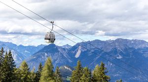 Preview wallpaper cabin, cable car, spruce, mountains, sky