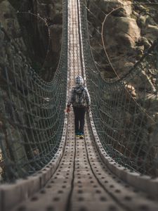 Preview wallpaper cable bridge, bridge, man, rocks