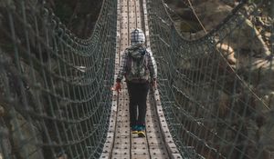 Preview wallpaper cable bridge, bridge, man, rocks