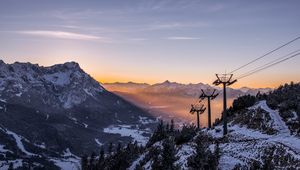 Preview wallpaper cableway, pillars, mountains, trees, sunrise, landscape