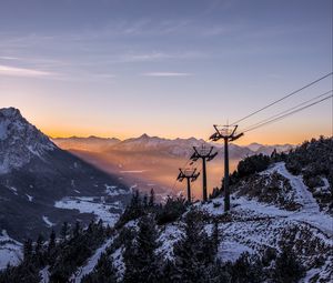 Preview wallpaper cableway, pillars, mountains, trees, sunrise, landscape