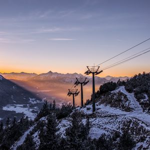 Preview wallpaper cableway, pillars, mountains, trees, sunrise, landscape