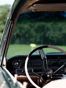 Preview wallpaper cadillac, car, steering wheel, retro, vintage