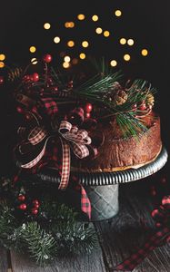 Preview wallpaper cake, branches, spruce, cones, bow, decoration