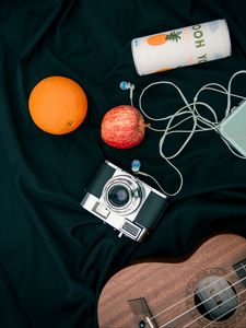 Preview wallpaper camera, apple, orange, headphones, guitar