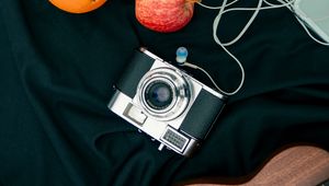 Preview wallpaper camera, apple, orange, headphones, guitar
