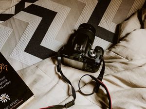 Preview wallpaper camera, black, strap, book