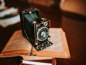 Preview wallpaper camera, equipment, book, retro, aesthetics