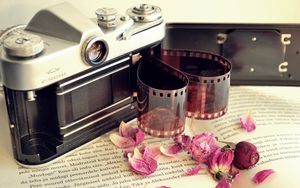 Preview wallpaper camera, film, books, flowers, dry, petals