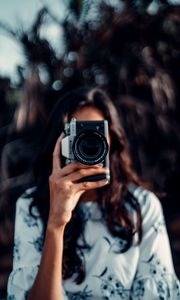 Preview wallpaper camera, girl, blur, focus