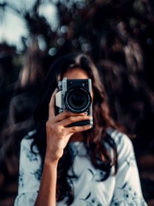 Preview wallpaper camera, girl, blur, focus