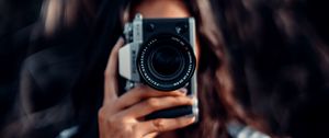 Preview wallpaper camera, girl, blur, focus