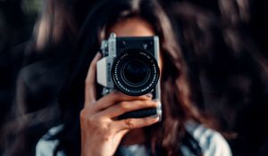 Preview wallpaper camera, girl, blur, focus