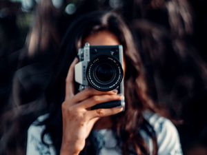 Preview wallpaper camera, girl, blur, focus