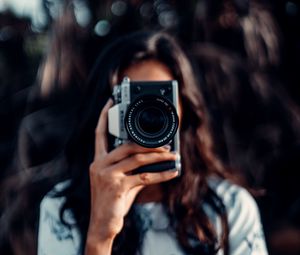 Preview wallpaper camera, girl, blur, focus
