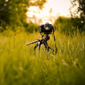 Preview wallpaper camera, grass, tripod