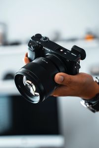 Preview wallpaper camera, hand, lens, optics