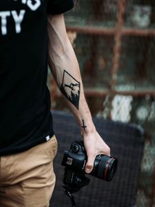 Preview wallpaper camera, hand, tattoo, photographer