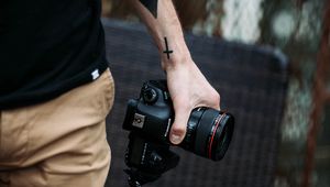 Preview wallpaper camera, hand, tattoo, photographer