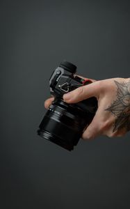Preview wallpaper camera, hand, tattoo, black, photo