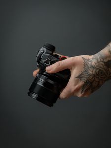 Preview wallpaper camera, hand, tattoo, black, photo