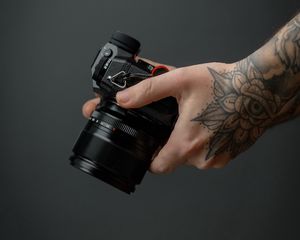 Preview wallpaper camera, hand, tattoo, black, photo