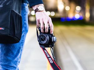 Preview wallpaper camera, hand, technology