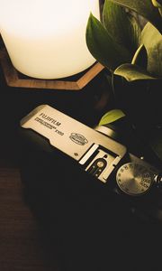 Preview wallpaper camera, lamp, plant
