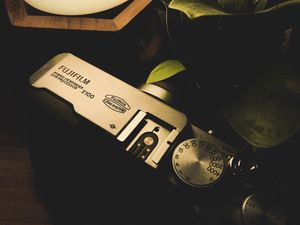Preview wallpaper camera, lamp, plant