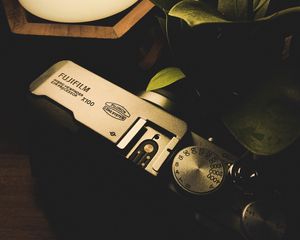 Preview wallpaper camera, lamp, plant