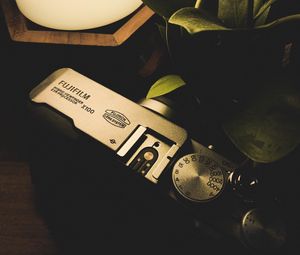 Preview wallpaper camera, lamp, plant