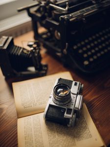 Preview wallpaper camera, lens, book, aesthetics