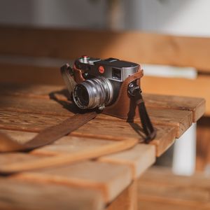 Preview wallpaper camera, lens, case, belt, leather