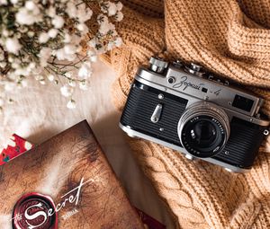 Preview wallpaper camera, lens, flowers, book, cloth