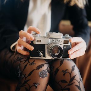 Preview wallpaper camera, lens, girl, legs, stockings