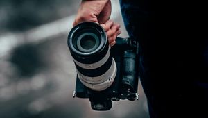 Preview wallpaper camera, lens, hand, focus