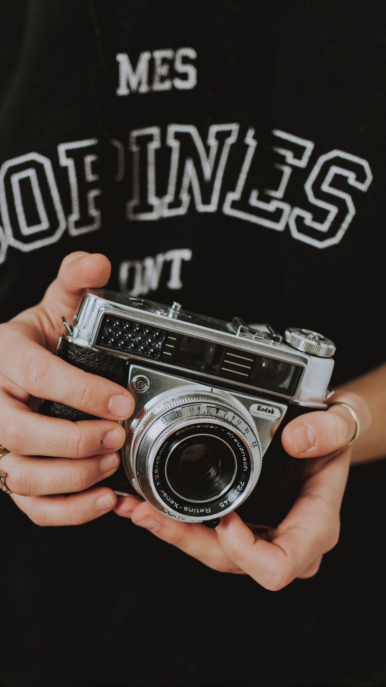 1350x2400 Wallpaper camera, lens, hands, fingers, photographer