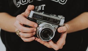 Preview wallpaper camera, lens, hands, fingers, photographer