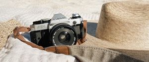 Preview wallpaper camera, lens, hat, beach
