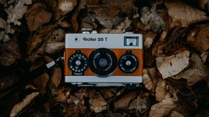 Preview wallpaper camera, lens, leaves, dry, retro