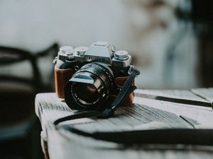 Preview wallpaper camera, lens, shooting, table, blur