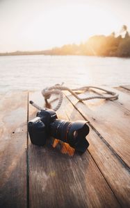 Preview wallpaper camera, lens, technique, pier, rays