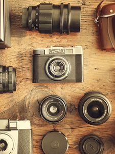 Preview wallpaper camera, lenses, table, wooden, retro