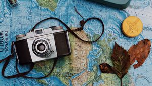Preview wallpaper camera, map, passport, still life