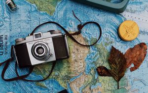 Preview wallpaper camera, map, passport, still life
