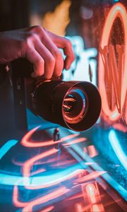 Preview wallpaper camera, objective, lens, hand, window, light, neon